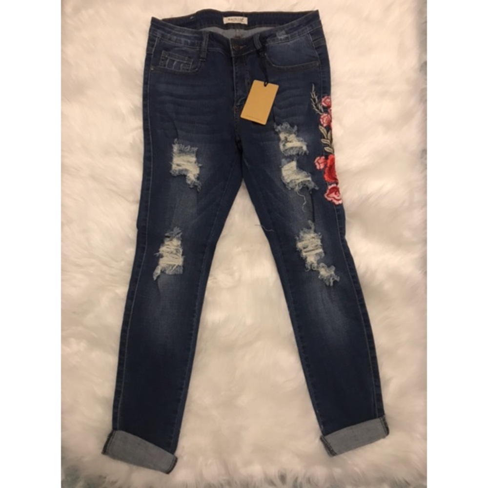 Distressed rose jeans